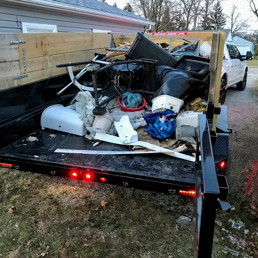 Roll-off dumpster delivered to a residential driveway in Pamelia