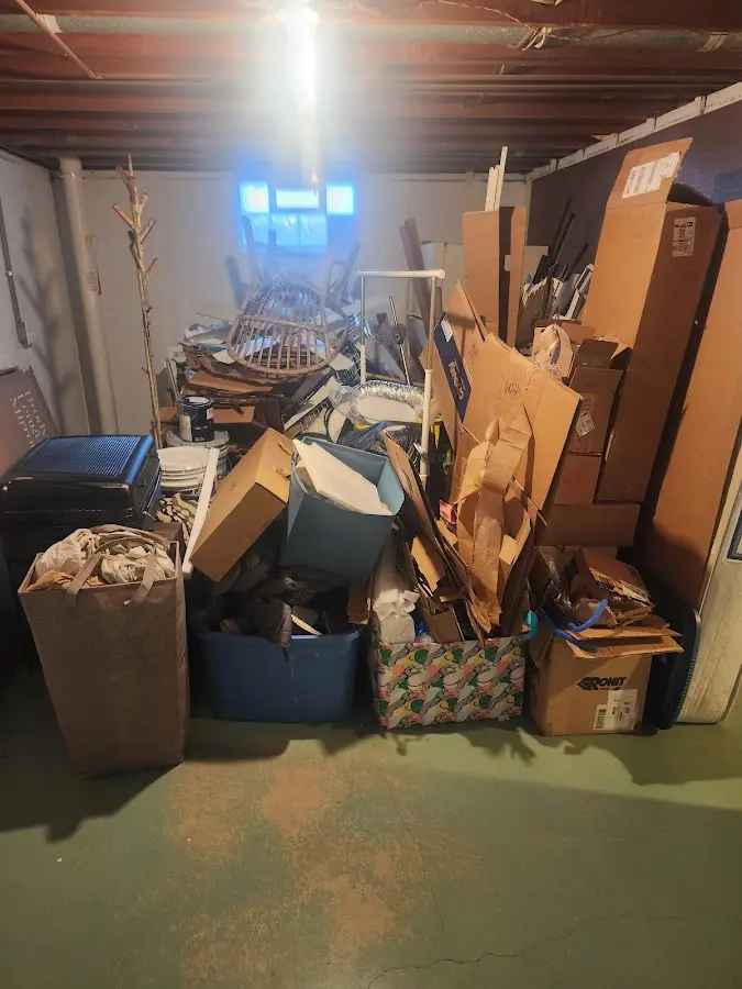 Roll-off dumpster container at job site for 2 Yard Dumpster Rental in Pamelia